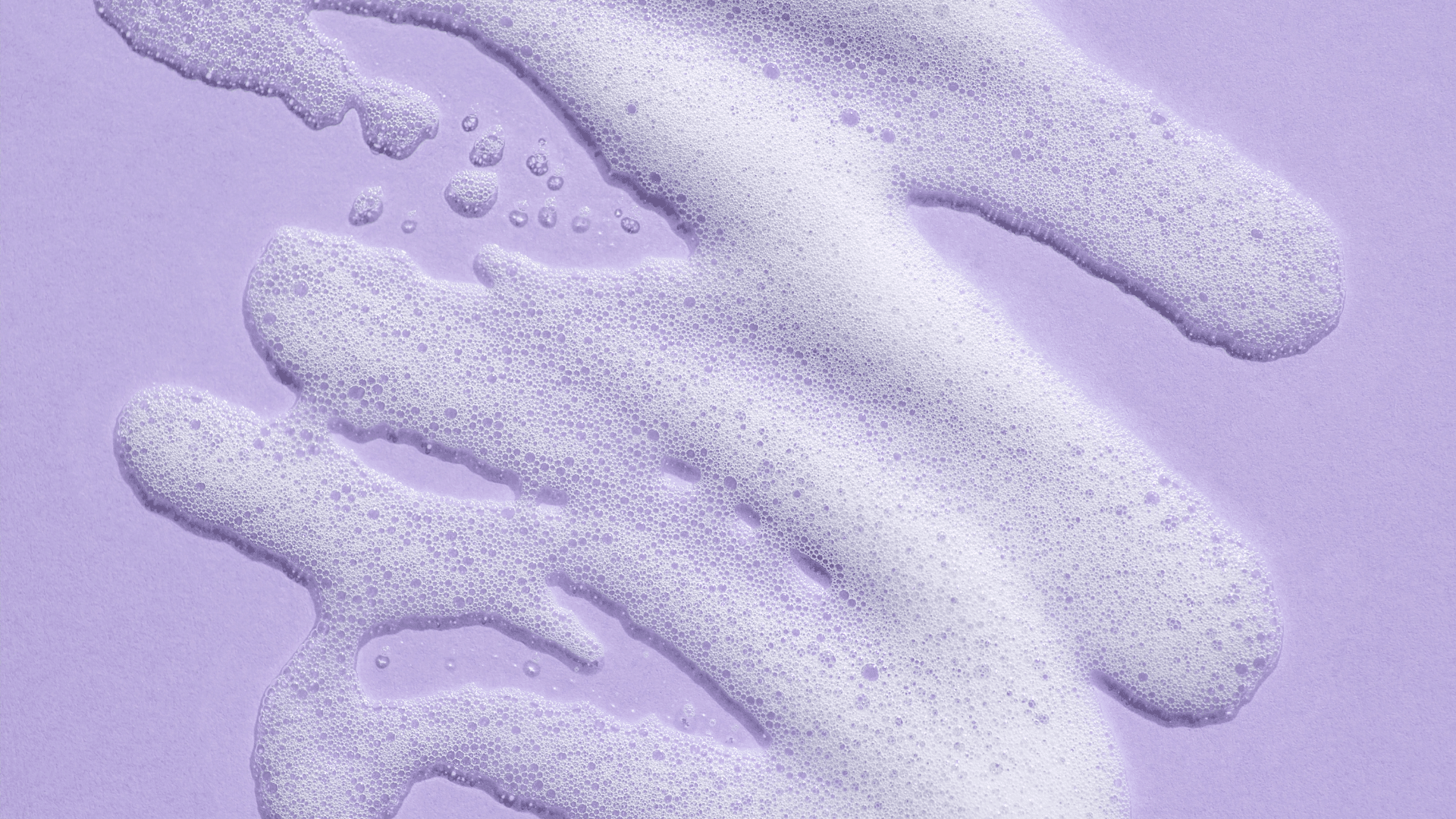 Soft foam on a lilac background