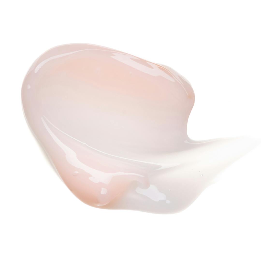 Light pink balm on a white background